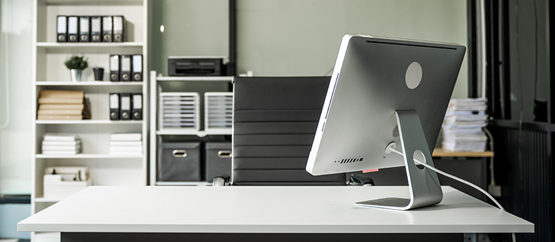 Modern office desk with computer
