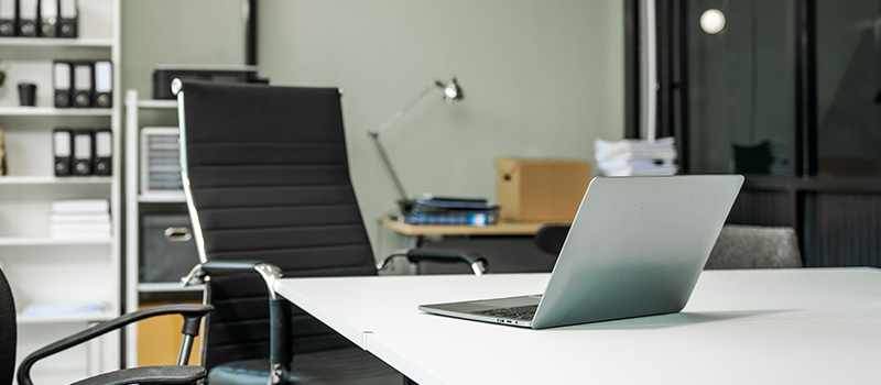 Modern office desk with laptop