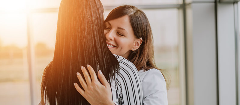 Should hugging be banned in the workplace?