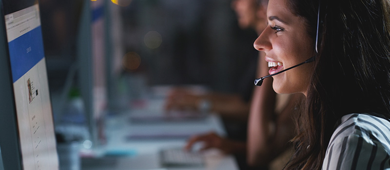 Smiling call center agent working