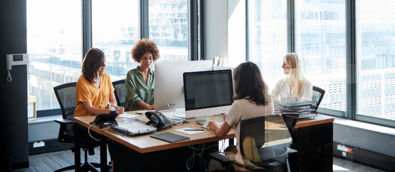 Women collaborating in modern office