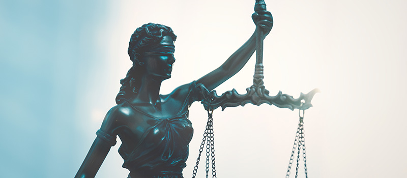 Manager sues law firm over misclassification & overtime complaints