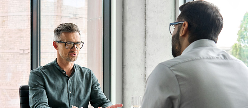 Business meeting discussion between colleagues
