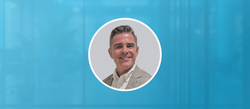 Image of man in circle on blue background
