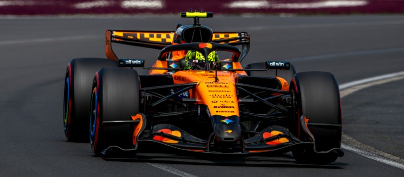 Orange Formula 1 car racing