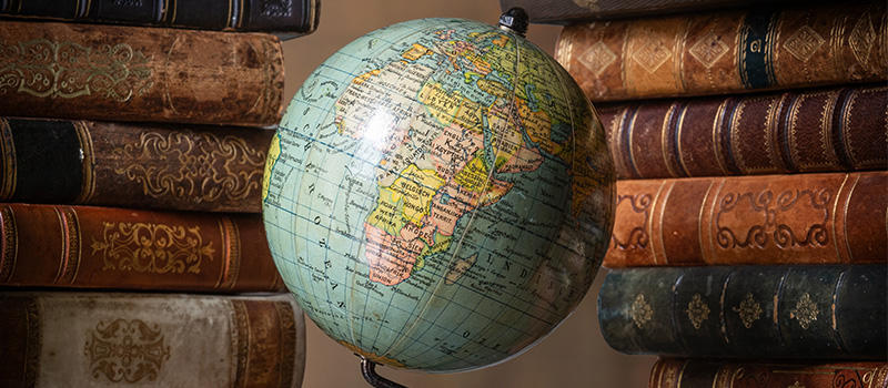 Vintage globe and antique books