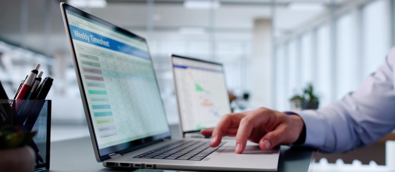 Employee updating digital timesheet