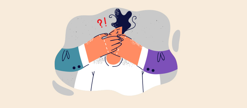 Person silenced by covering hands