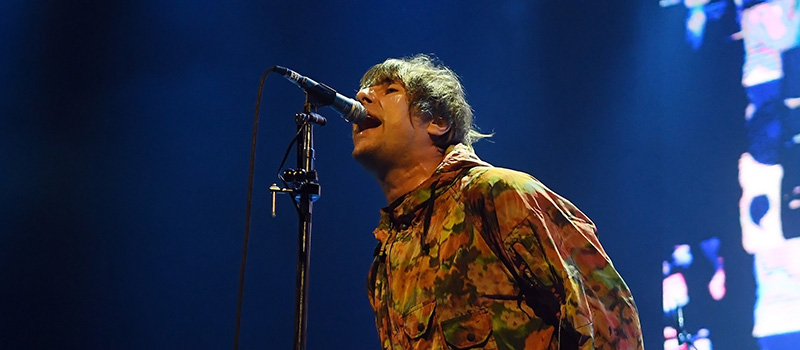 Singer Oasis performing on stage live