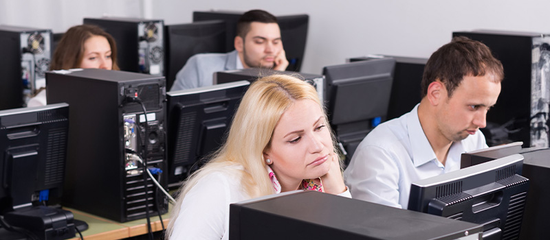 Bored employees in office environment