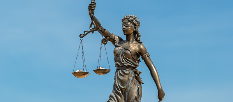 Lady Justice statue holding scales
