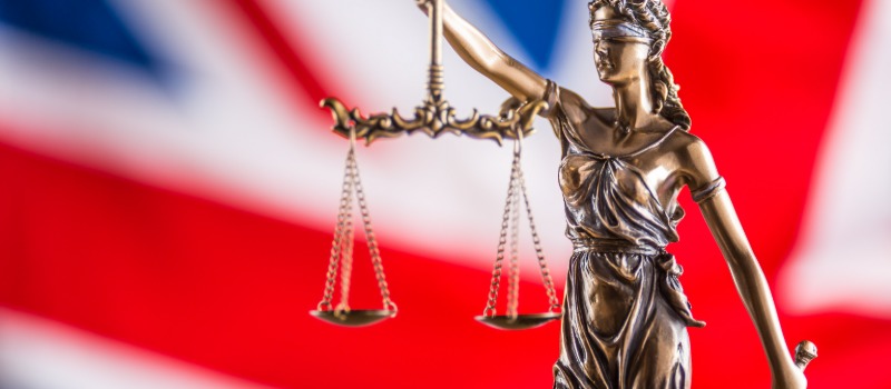 Lady Justice with UK flag