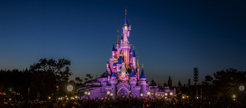 Disneyland castle illuminated at night