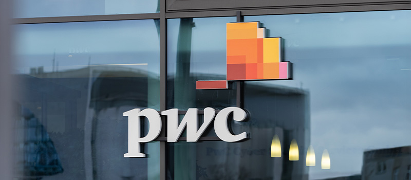 PwC logo on building exterior