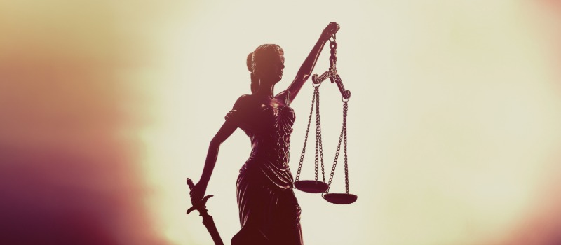 Lady Justice holding balance scales