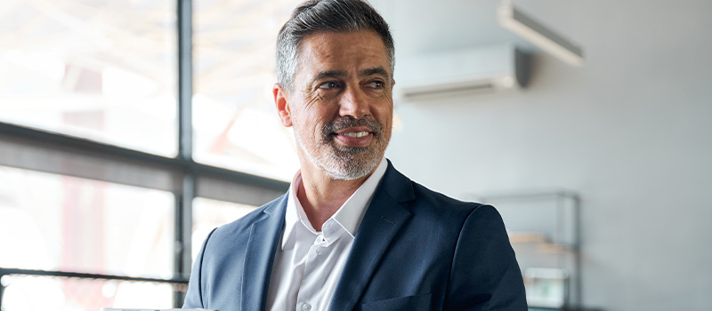 Confident businessman in modern office