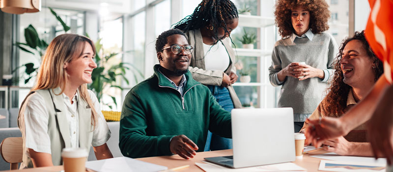 Diverse team collaborating in office