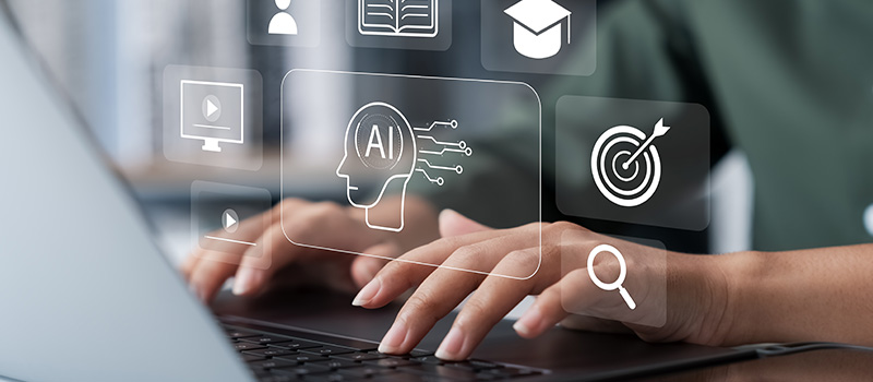 Hands typing with AI icons