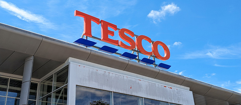 Tesco supermarket exterior signage sky