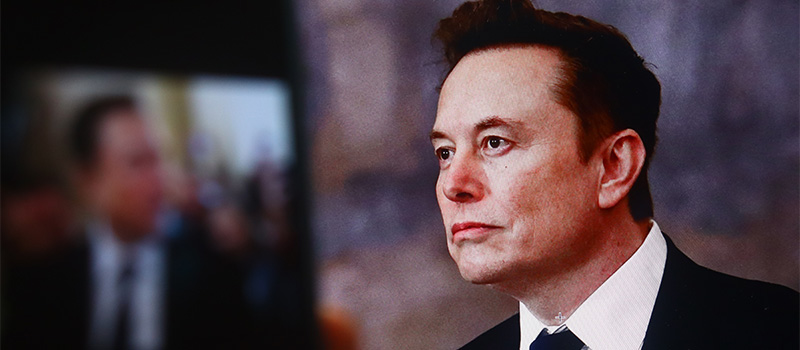 Elon Musk looking out of frame