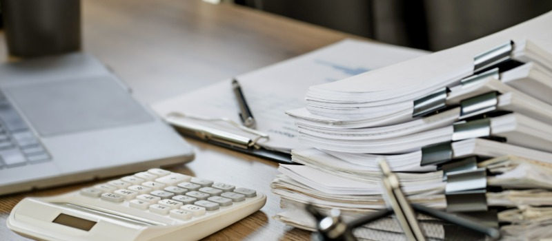 Office desk with financial documents