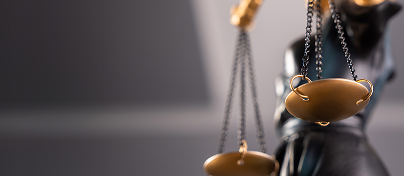 Lady Justice holding balance scales