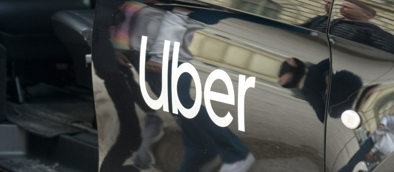 Uber logo on car door