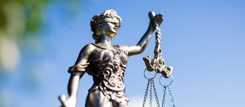 Lady Justice statue with scales
