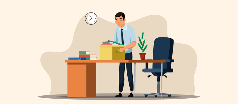 Employee packing office belongings