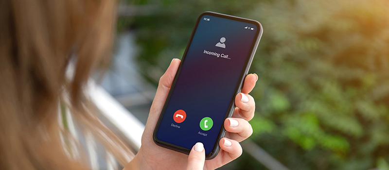 Person receiving incoming phone call