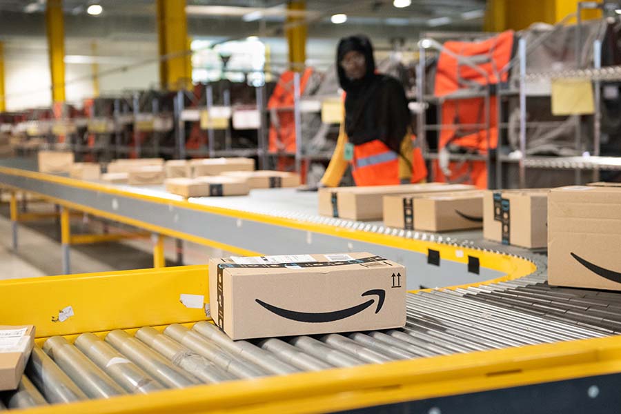 Amazon adapts remote working rules as visa delays strand staff