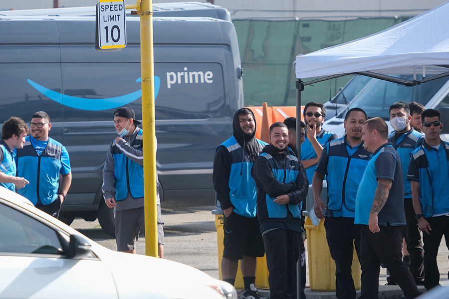 Amazon delivery team outside vans