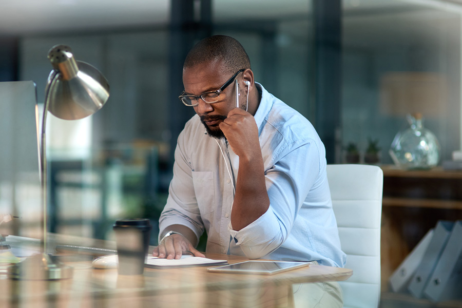 Focused businessman working at desk