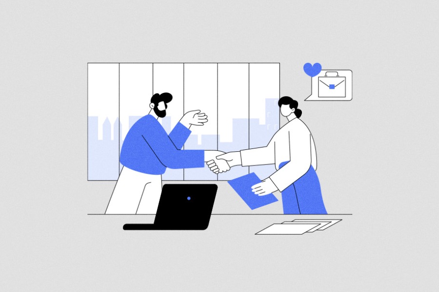 Business handshake in office setting