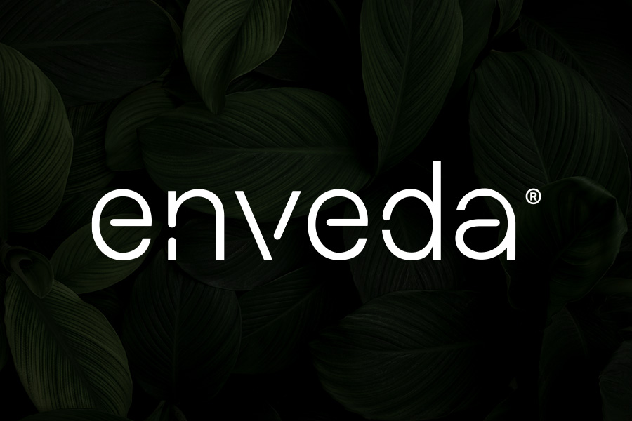 Enveda logo with leafy background