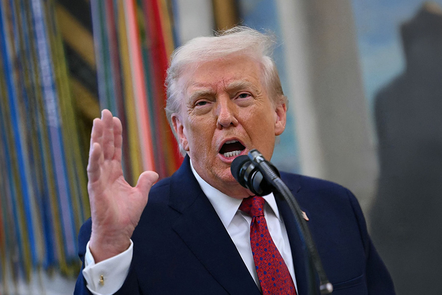 Ford suspends 'lunatic' worker after viral confrontation with President Trump