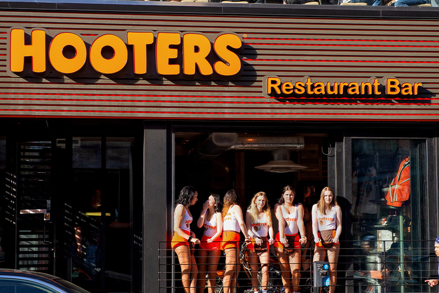 Hooters settles $250,000 lawsuit alleging it recalled “mostly white” employees post-Covid