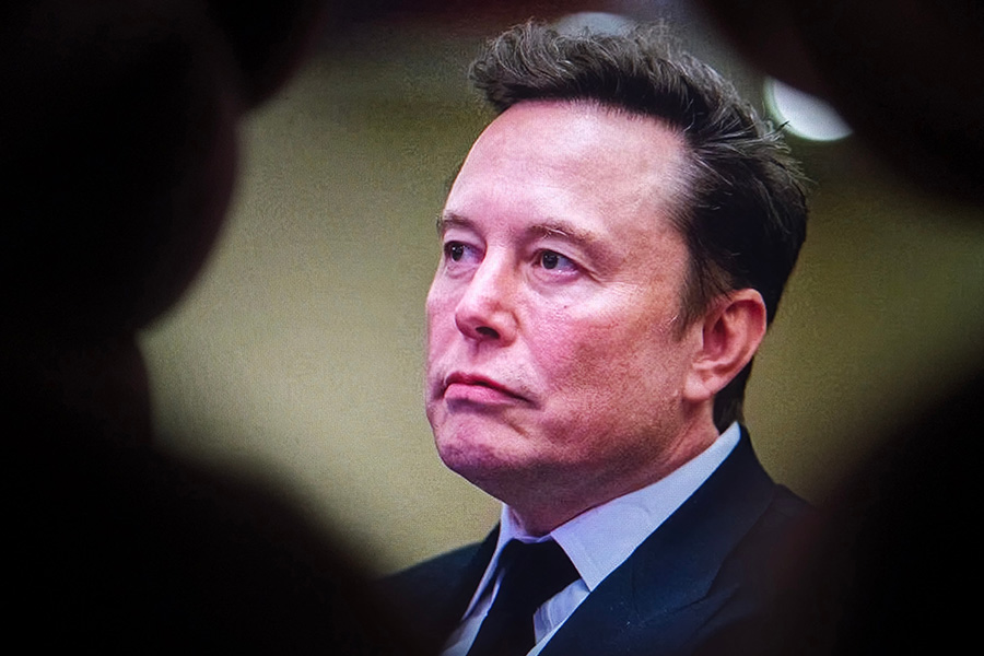 Musk's three bullets - a viable alternative to resumes & cover letters? Elon Musk in suit portrait closeup