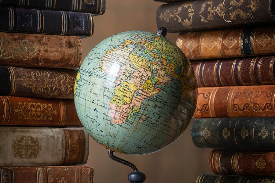 Vintage globe and antique books