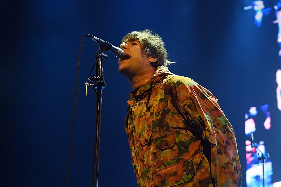 Singer Oasis performing on stage live