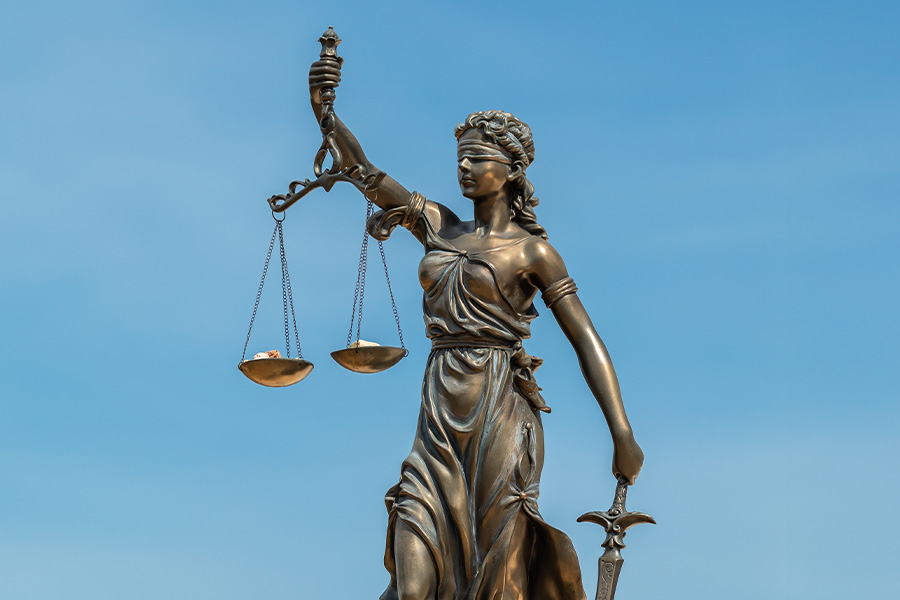 Lady Justice statue holding scales
