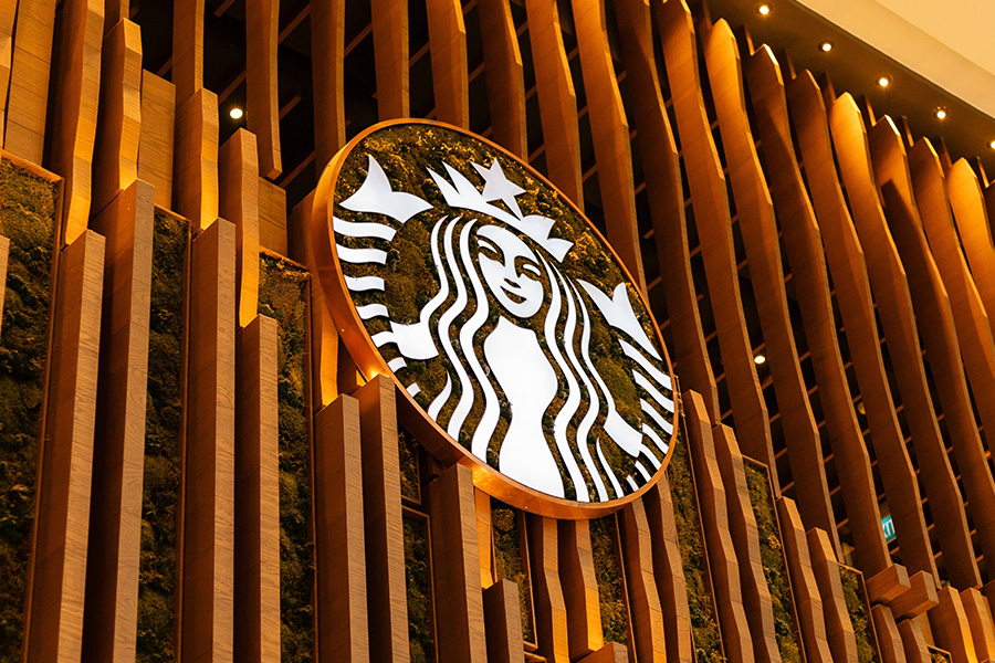 Starbucks logo on wooden wall