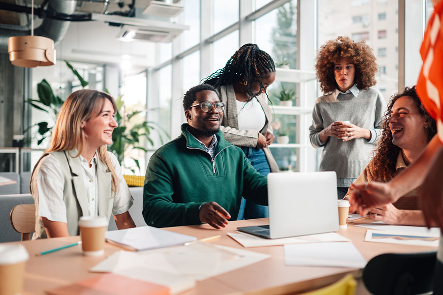 Losing your best employees? Poor career growth could be the problem Diverse team collaborating in office