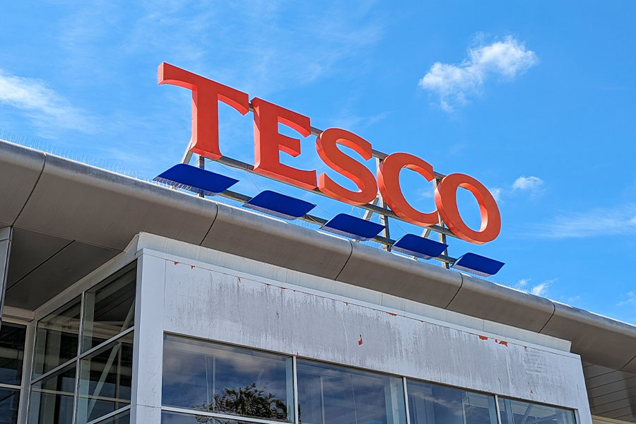 Tesco supermarket exterior signage sky