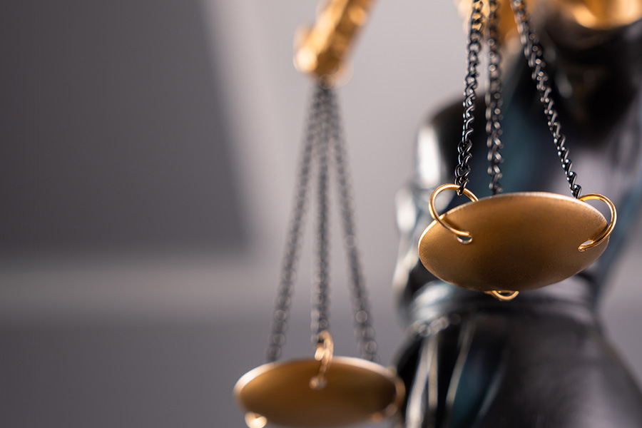 Lady Justice holding balance scales