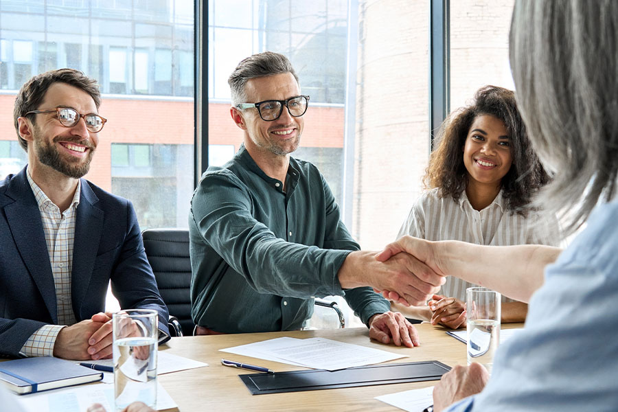 Business meeting handshake job interview