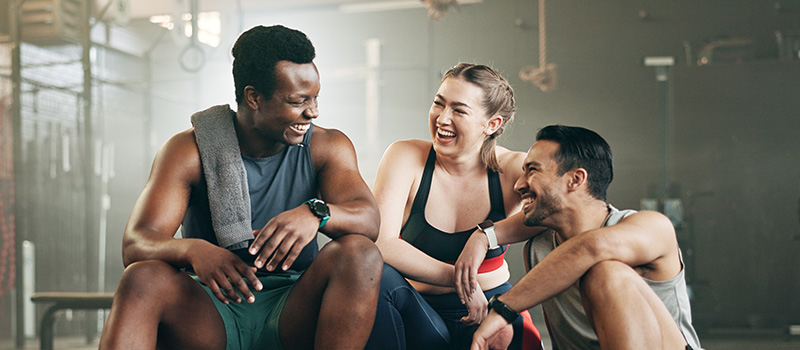 Friends laughing after gym workout