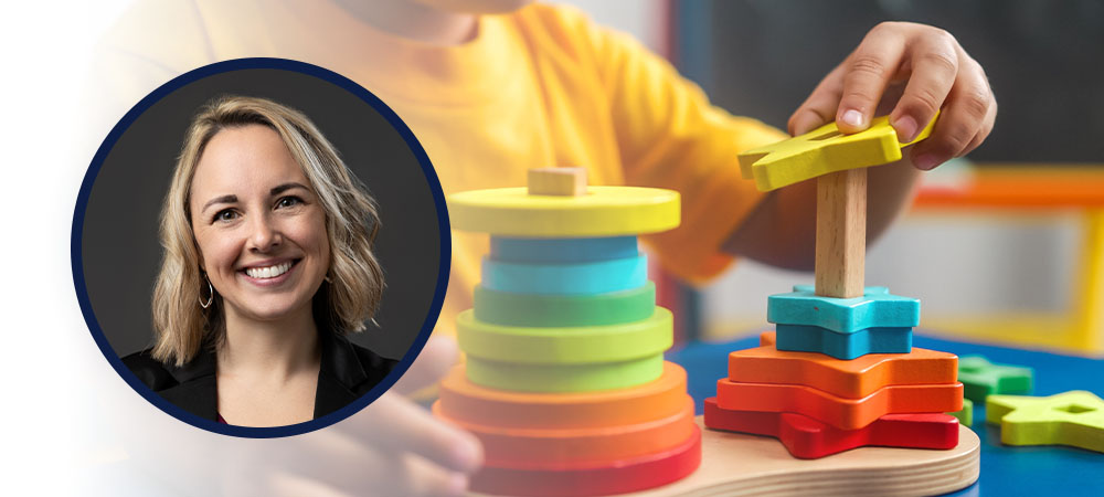 Child playing with stacking toys